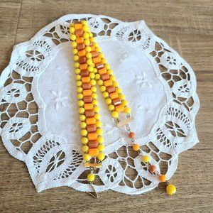 Bohemian vintage orange and yellow plastic chocker necklace.